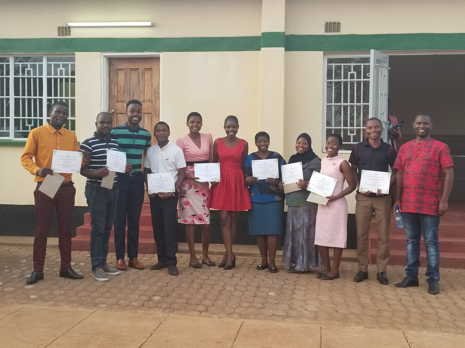 Interns receiving certificates from LAPE